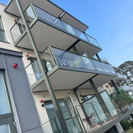 metal railings on a balcony taken from a low angle and slanted