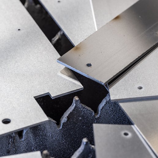 multiple industrial metal plates overlapping the edges